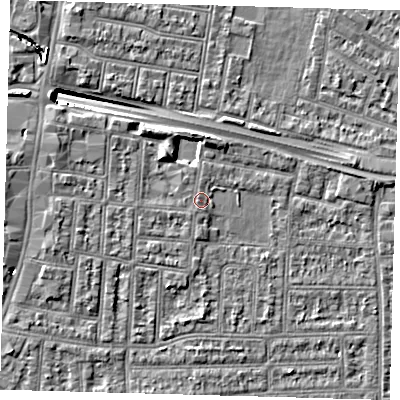 Shaded relief map of the ground around N182JT, computed from Environment Agency LiDAR. The ground here sits at about 12 m above sea level and falls 10 m across the surrounding 800 m. Surface water reaching this point runs off ground lying to the south-south-west, 0.5 m higher.