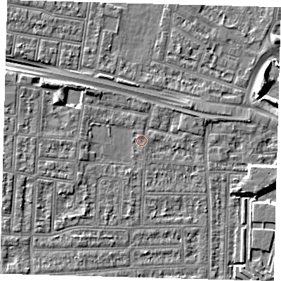 Shaded relief map of the ground around N182JX, computed from Environment Agency LiDAR. The ground here sits at about 12 m above sea level and falls 8 m across the surrounding 800 m. Surface water reaching this point runs off ground lying to the north-north-west, 0.7 m higher.