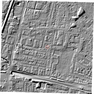 Shaded relief map of the ground around N182PX, computed from Environment Agency LiDAR. The ground here sits at about 12 m above sea level and falls 13 m across the surrounding 800 m. Surface water reaching this point runs off ground lying to the west-north-west, 6.2 m higher.