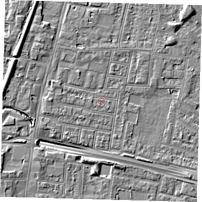 Shaded relief map of the ground around N182PZ, computed from Environment Agency LiDAR. The ground here sits at about 12 m above sea level and falls 13 m across the surrounding 800 m. Surface water reaching this point runs off ground lying to the south-south-west, 0.6 m higher.