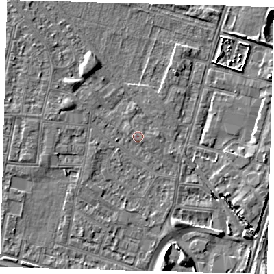 Shaded relief map of the ground around N182QG, computed from Environment Agency LiDAR. The ground here sits at about 12 m above sea level and falls 7 m across the surrounding 800 m. Surface water reaching this point runs off ground lying to the west-north-west, 2.2 m higher.