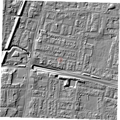 Shaded relief map of the ground around N182QJ, computed from Environment Agency LiDAR. The ground here sits at about 13 m above sea level and falls 13 m across the surrounding 800 m. Surface water reaching this point runs off ground lying to the west, 1.5 m higher.
