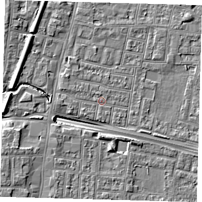 Shaded relief map of the ground around N182QP, computed from Environment Agency LiDAR. The ground here sits at about 13 m above sea level and falls 13 m across the surrounding 800 m. Surface water reaching this point runs off ground lying to the west, 1.5 m higher.