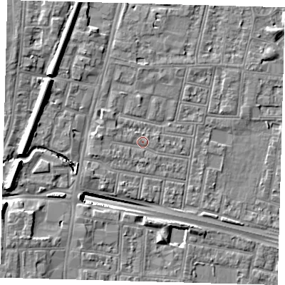 Shaded relief map of the ground around N182QU, computed from Environment Agency LiDAR. The ground here sits at about 13 m above sea level and falls 13 m across the surrounding 800 m. Surface water reaching this point runs off ground lying to the west, 1.9 m higher.