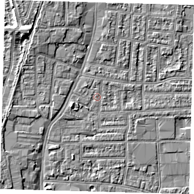 Shaded relief map of the ground around N182RT, computed from Environment Agency LiDAR. The ground here sits at about 12 m above sea level and falls 9 m across the surrounding 800 m. Surface water reaching this point runs off ground lying to the north-west, 1.4 m higher.