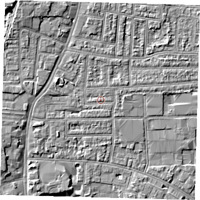 Shaded relief map of the ground around N182RX, computed from Environment Agency LiDAR. The ground here sits at about 12 m above sea level and falls 11 m across the surrounding 800 m. Surface water reaching this point runs off ground lying to the north-west, 4.5 m higher.