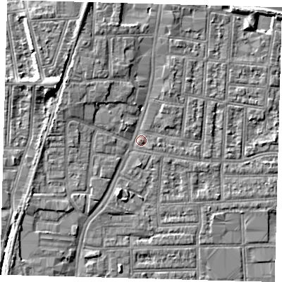 Shaded relief map of the ground around N182SW, computed from Environment Agency LiDAR. The ground here sits at about 13 m above sea level and falls 9 m across the surrounding 800 m. Surface water reaching this point runs off ground lying to the north-north-west, 4.5 m higher.
