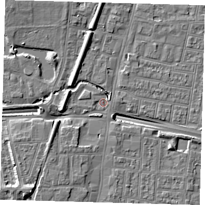 Shaded relief map of the ground around N182UD, computed from Environment Agency LiDAR. The ground here sits at about 13 m above sea level and falls 14 m across the surrounding 800 m. Surface water reaching this point runs off ground lying to the south-west, 7.7 m higher.