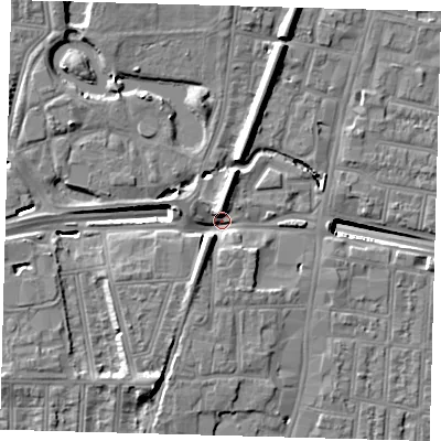 Shaded relief map of the ground around N182UE, computed from Environment Agency LiDAR. The ground here sits at about 13 m above sea level and falls 14 m across the surrounding 800 m. Surface water reaching this point runs off ground lying to the south-south-west, 12.4 m higher.