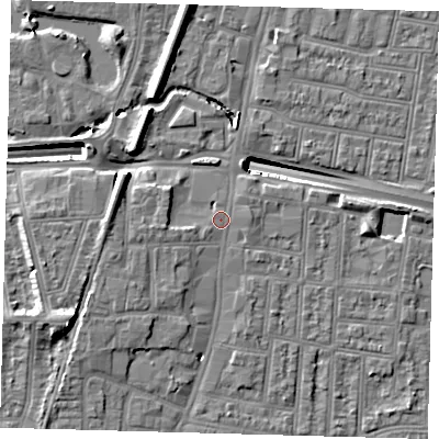 Shaded relief map of the ground around N182UX, computed from Environment Agency LiDAR. The ground here sits at about 14 m above sea level and falls 14 m across the surrounding 800 m. Surface water reaching this point runs off ground lying to the east, 1.0 m higher.