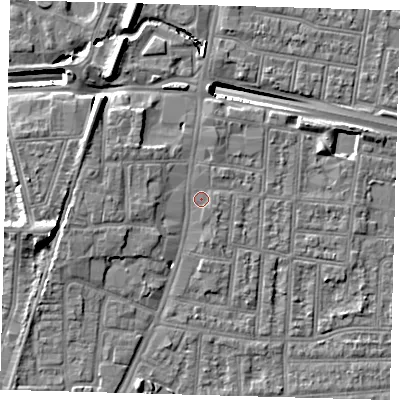 Shaded relief map of the ground around N182XQ, computed from Environment Agency LiDAR. The ground here sits at about 13 m above sea level and falls 14 m across the surrounding 800 m. Surface water reaching this point runs off ground lying to the north-north-east, 1.3 m higher.