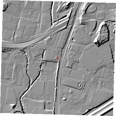 Shaded relief map of the ground around N183HE, computed from Environment Agency LiDAR. The ground here sits at about 11 m above sea level and falls 14 m across the surrounding 800 m. Surface water reaching this point runs off ground lying to the north, 2.1 m higher.