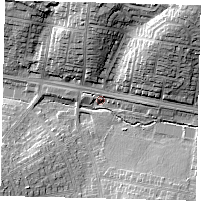 Shaded relief map of the ground around N20EQ, computed from Environment Agency LiDAR. The ground here sits at about 65 m above sea level and falls 30 m across the surrounding 800 m. Surface water reaching this point runs off ground lying to the south-east, 8.9 m higher.