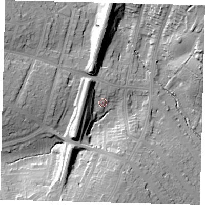 Shaded relief map of the ground around N212HE, computed from Environment Agency LiDAR. The ground here sits at about 30 m above sea level and falls 25 m across the surrounding 800 m. Surface water reaching this point runs off ground lying to the west-north-west, 12.6 m higher.