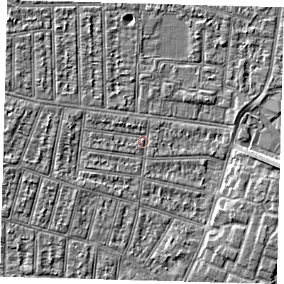 Shaded relief map of the ground around N90JT, computed from Environment Agency LiDAR. The ground here sits at about 12 m above sea level and falls 5 m across the surrounding 800 m. Surface water reaching this point runs off ground lying to the west-north-west, 1.3 m higher.