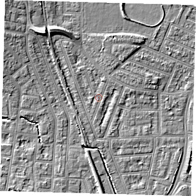 Shaded relief map of the ground around N97JS, computed from Environment Agency LiDAR. The ground here sits at about 15 m above sea level and falls 10 m across the surrounding 800 m. Surface water reaching this point runs off ground lying to the north-west, 8.3 m higher.