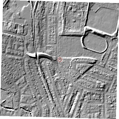 Shaded relief map of the ground around N97NX, computed from Environment Agency LiDAR. The ground here sits at about 16 m above sea level and falls 9 m across the surrounding 800 m. Surface water reaching this point runs off ground lying to the west-north-west, 7.1 m higher.