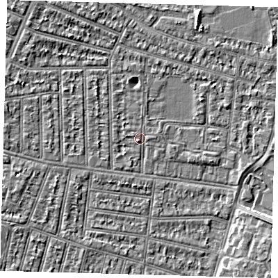 Shaded relief map of the ground around N98LG, computed from Environment Agency LiDAR. The ground here sits at about 12 m above sea level and falls 4 m across the surrounding 800 m. Surface water reaching this point runs off ground lying to the south-south-west, 1.0 m higher.