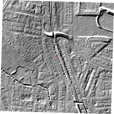 Shaded relief map of the ground around N99DG, computed from Environment Agency LiDAR. The ground here sits at about 16 m above sea level and falls 10 m across the surrounding 800 m. Surface water reaching this point runs off ground lying to the north-north-west, 6.5 m higher.