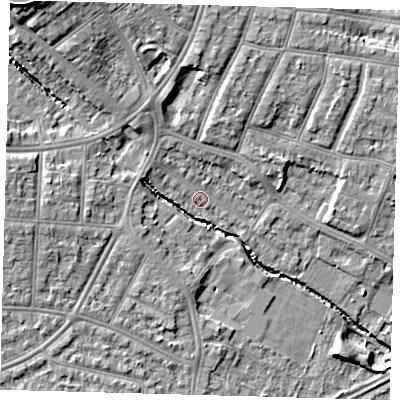 Shaded relief map of the ground around N99HU, computed from Environment Agency LiDAR. The ground here sits at about 21 m above sea level and falls 15 m across the surrounding 800 m. Surface water reaching this point runs off ground lying to the west, 6.5 m higher.
