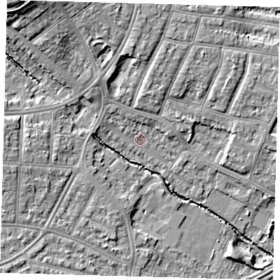 Shaded relief map of the ground around N99HX, computed from Environment Agency LiDAR. The ground here sits at about 21 m above sea level and falls 16 m across the surrounding 800 m. Surface water reaching this point runs off ground lying to the west, 6.2 m higher.