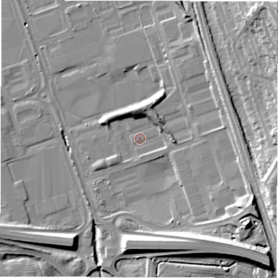 Shaded relief map of the ground around NE110BQ, computed from Environment Agency LiDAR. The ground here sits at about 13 m above sea level and falls 31 m across the surrounding 800 m. Surface water reaching this point runs off ground lying to the east, 4.2 m higher.