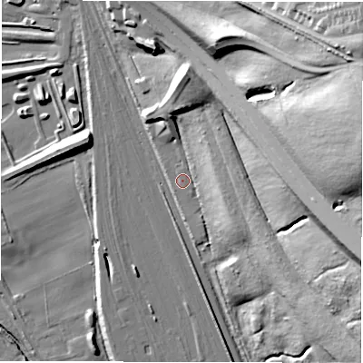 Shaded relief map of the ground around NE110EX, computed from Environment Agency LiDAR. The ground here sits at about 23 m above sea level and falls 59 m across the surrounding 800 m. Surface water reaching this point runs off ground lying to the east-south-east, 39.3 m higher.