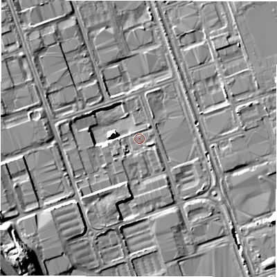Shaded relief map of the ground around NE110RS, computed from Environment Agency LiDAR. The ground here sits at about 11 m above sea level and falls 23 m across the surrounding 800 m. Surface water reaching this point runs off ground lying to the south-south-west, 3.2 m higher.