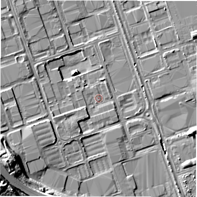 Shaded relief map of the ground around NE110RT, computed from Environment Agency LiDAR. The ground here sits at about 12 m above sea level and falls 24 m across the surrounding 800 m. Surface water reaching this point runs off ground lying to the south-south-west, 3.0 m higher.