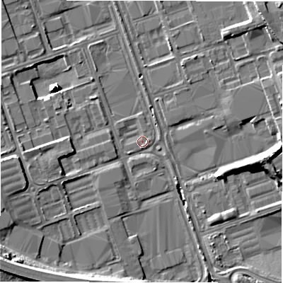 Shaded relief map of the ground around NE110RU, computed from Environment Agency LiDAR. The ground here sits at about 11 m above sea level and falls 15 m across the surrounding 800 m. Surface water reaching this point runs off ground lying to the south-west, 12.8 m higher.
