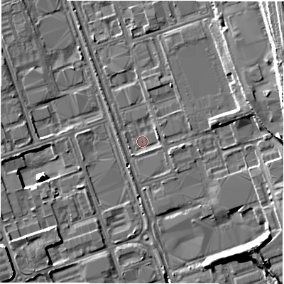Shaded relief map of the ground around NE110SH, computed from Environment Agency LiDAR. The ground here sits at about 11 m above sea level and falls 13 m across the surrounding 800 m. Surface water reaching this point runs off ground lying to the east, 1.9 m higher.