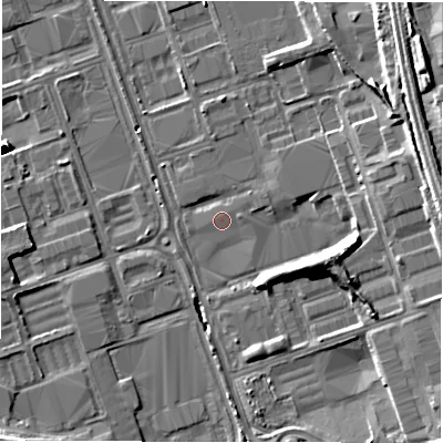 Shaded relief map of the ground around NE110SP, computed from Environment Agency LiDAR. The ground here sits at about 12 m above sea level and falls 15 m across the surrounding 800 m. Surface water reaching this point runs off ground lying to the north-east, 9.0 m higher.