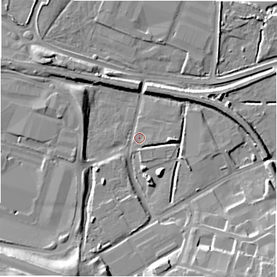 Shaded relief map of the ground around NE119HQ, computed from Environment Agency LiDAR. The ground here sits at about 3 m above sea level and falls 16 m across the surrounding 800 m. Surface water reaching this point runs off ground lying to the south-south-west, 12.4 m higher.