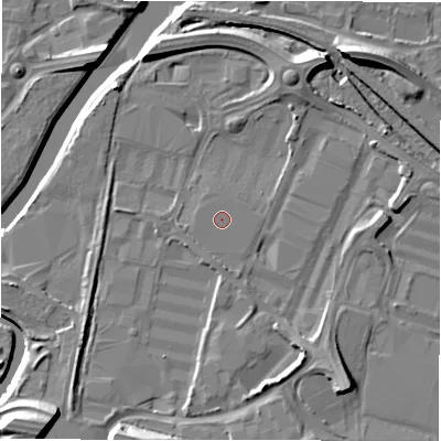 Shaded relief map of the ground around NE119YA, computed from Environment Agency LiDAR. The ground here sits at about 5 m above sea level and falls 13 m across the surrounding 800 m. The ground contributing surface water to this point lies to the south-east.