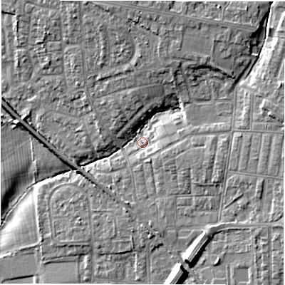 Shaded relief map of the ground around NE127JP, computed from Environment Agency LiDAR. The ground here sits at about 57 m above sea level and falls 13 m across the surrounding 800 m. Surface water reaching this point runs off ground lying to the east, 7.0 m higher.