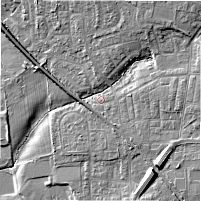 Shaded relief map of the ground around NE127JX, computed from Environment Agency LiDAR. The ground here sits at about 56 m above sea level and falls 14 m across the surrounding 800 m. Surface water reaching this point runs off ground lying to the north-north-east, 7.0 m higher.