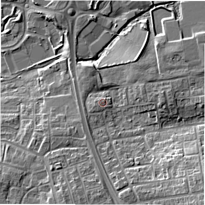 Shaded relief map of the ground around NE128ED, computed from Environment Agency LiDAR. The ground here sits at about 52 m above sea level and falls 15 m across the surrounding 800 m. Surface water reaching this point runs off ground lying to the west-south-west, 1.8 m higher.