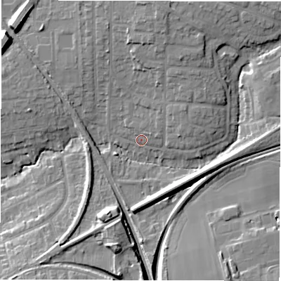 Shaded relief map of the ground around NE129LA, computed from Environment Agency LiDAR. The ground here sits at about 57 m above sea level and falls 13 m across the surrounding 800 m. Surface water reaching this point runs off ground lying to the north, 10.1 m higher.