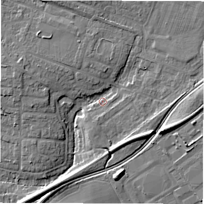 Shaded relief map of the ground around NE129RH, computed from Environment Agency LiDAR. The ground here sits at about 60 m above sea level and falls 11 m across the surrounding 800 m. Surface water reaching this point runs off ground lying to the south-east, 7.9 m higher.