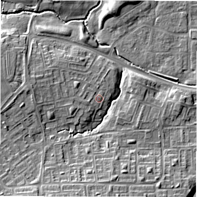 Shaded relief map of the ground around NE137BG, computed from Environment Agency LiDAR. The ground here sits at about 60 m above sea level and falls 14 m across the surrounding 800 m. Surface water reaching this point runs off ground lying to the west-south-west, 1.3 m higher.