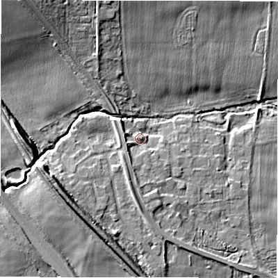 Shaded relief map of the ground around NE138BL, computed from Environment Agency LiDAR. The ground here sits at about 65 m above sea level and falls 11 m across the surrounding 800 m. Surface water reaching this point runs off ground lying to the south, 4.3 m higher.