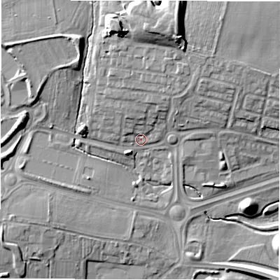 Shaded relief map of the ground around NE139DF, computed from Environment Agency LiDAR. The ground here sits at about 65 m above sea level and falls 18 m across the surrounding 800 m. Surface water reaching this point runs off ground lying to the north-north-east, 13.2 m higher.