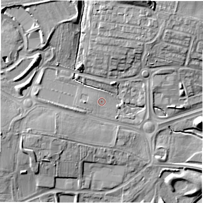 Shaded relief map of the ground around NE139ER, computed from Environment Agency LiDAR. The ground here sits at about 65 m above sea level and falls 18 m across the surrounding 800 m. Surface water reaching this point runs off ground lying to the west, 2.9 m higher.