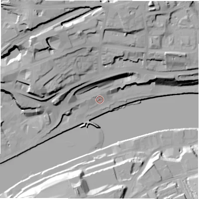 Shaded relief map of the ground around NE13DX, computed from Environment Agency LiDAR. The ground here sits at about 7 m above sea level and falls 43 m across the surrounding 800 m. Surface water reaching this point runs off ground lying to the north-north-east, 22.2 m higher.