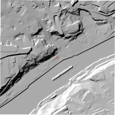 Shaded relief map of the ground around NE13RG, computed from Environment Agency LiDAR. The ground here sits at about 4 m above sea level and falls 42 m across the surrounding 800 m. Surface water reaching this point runs off ground lying to the north-west, 22.3 m higher.