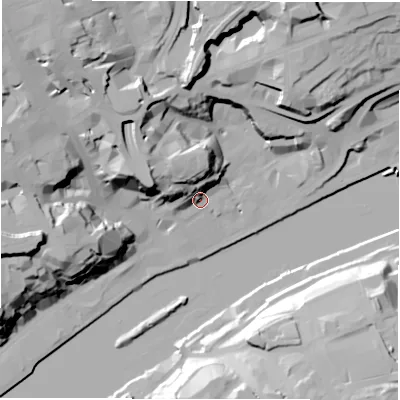 Shaded relief map of the ground around NE13UQ, computed from Environment Agency LiDAR. The ground here sits at about 7 m above sea level and falls 42 m across the surrounding 800 m. Surface water reaching this point runs off ground lying to the north-north-west, 18.8 m higher.