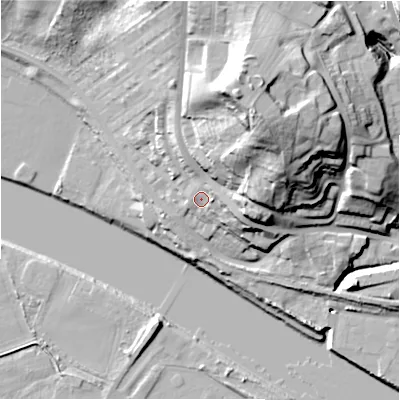 Shaded relief map of the ground around NE158LS, computed from Environment Agency LiDAR. The ground here sits at about 14 m above sea level and falls 45 m across the surrounding 800 m. Surface water reaching this point runs off ground lying to the north-east, 33.7 m higher.