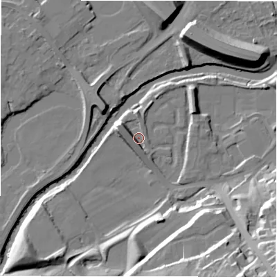 Shaded relief map of the ground around NE163BN, computed from Environment Agency LiDAR. The ground here sits at about 5 m above sea level and falls 33 m across the surrounding 800 m. Surface water reaching this point runs off ground lying to the north-west, 5.9 m higher.