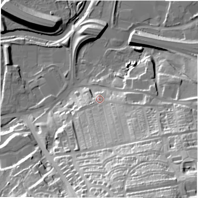 Shaded relief map of the ground around NE163DX, computed from Environment Agency LiDAR. The ground here sits at about 15 m above sea level and falls 62 m across the surrounding 800 m. Surface water reaching this point runs off ground lying to the south-south-east, 47.1 m higher.