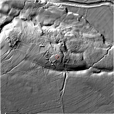 Shaded relief map of the ground around NE191RY, computed from Environment Agency LiDAR. The ground here sits at about 203 m above sea level and falls 70 m across the surrounding 800 m. Surface water reaching this point runs off ground lying to the west, 0.8 m higher.